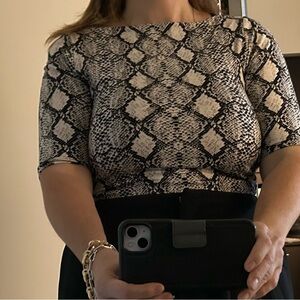 Size M snake print top
